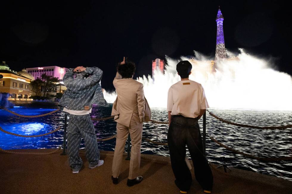 BTS band members J-Hope, V and Jung Kook are shown at Bellagio Fountains while previewing the s ...