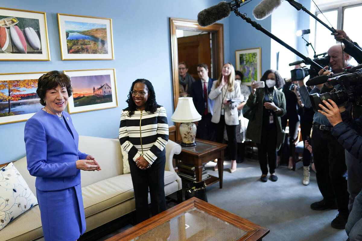 Sen. Susan Collins, R-Maine, left, talks to media as she meets with Supreme Court nominee Ketan ...