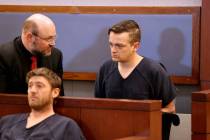 Brandon Toseland, right, confers with his attorney, Augustus Claus, in court at the Regional Ju ...