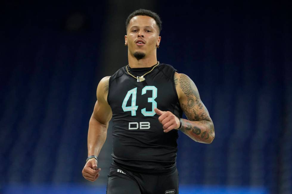 Miami defensive back Bubba Bolden runs the 40-yard dash at the NFL football scouting combine, S ...