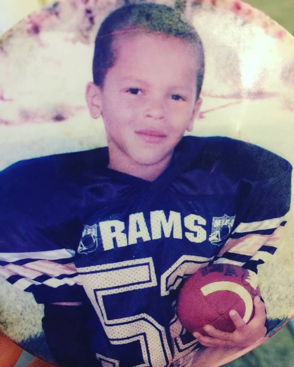 A young Bubba Bolden poses for a football photo. (Breezy Bolden)