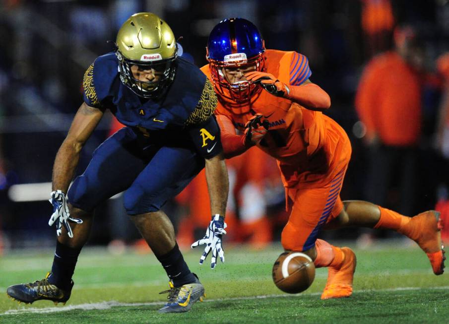 St. Thomas Aguinas, Fla. wide receiver Jordan Merrell, left, is unable to catch a low pass whil ...