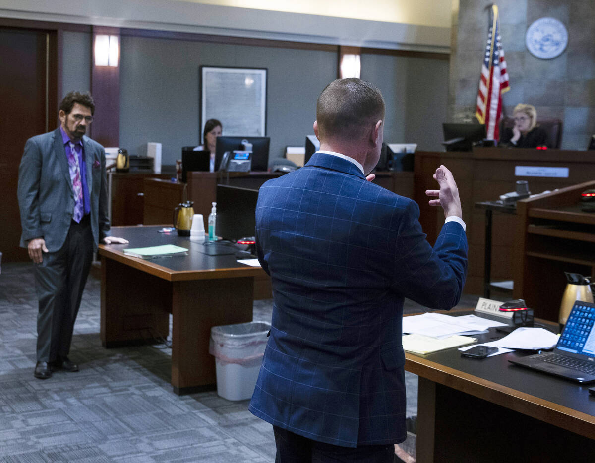 Prosecutor Michael Dickerson, center, addresses the court during Brandon Leath’s sentenc ...