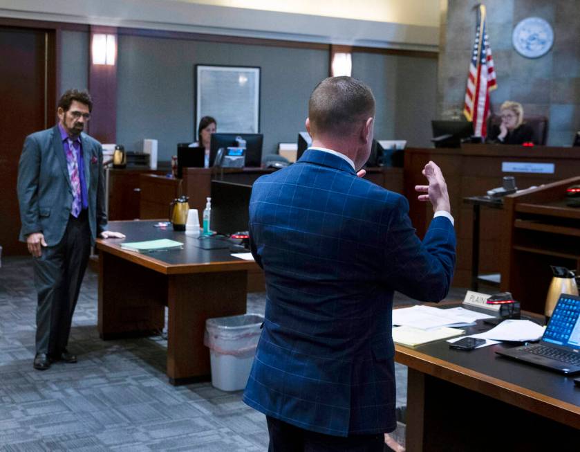 Prosecutor Michael Dickerson, center, addresses the court during Brandon Leath’s sentenc ...