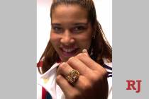 In this Dec. 14, 2000, file photo, gold medalist Natalie Williams displays her Olympic ring at ...