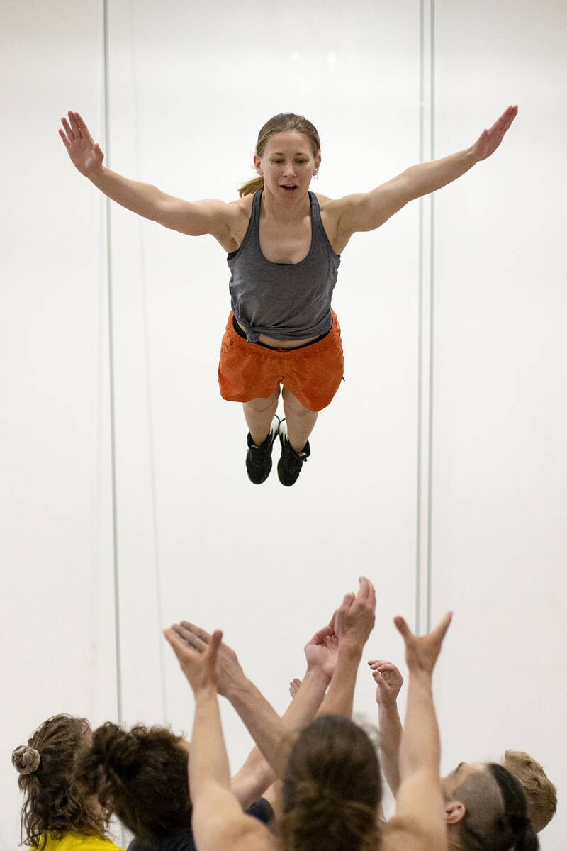 Marta Brown, who performs in the teeterboard act, practices a section of IGNITE during rehearsa ...