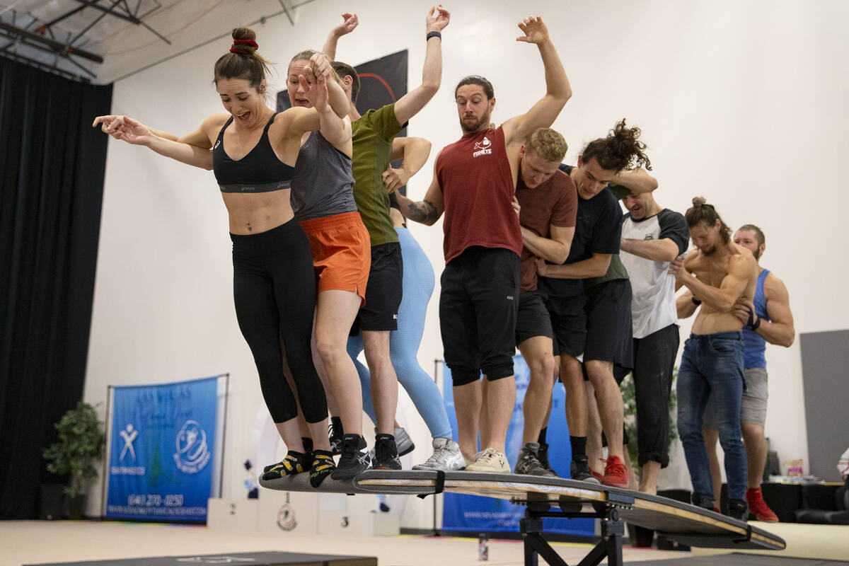 Performers for the teeterboard act rehearse a scene for IGNITE at Nevada Rhythmic Academy on Fr ...