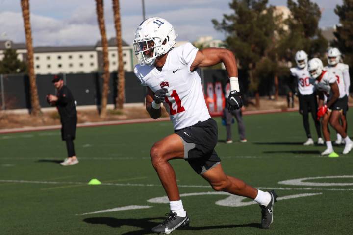 UNLV Rebels Ricky White (11) runs through drills during the first day of spring football practi ...