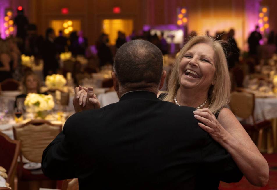 Lisa Cotter, right/facing, and Mathew D’Ercole share a dance during Nevada Ballet Theatr ...