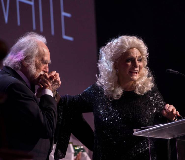 Grammy Award-winning singer, songwriter, author, activist and humanitarian Judy Collins, right, ...