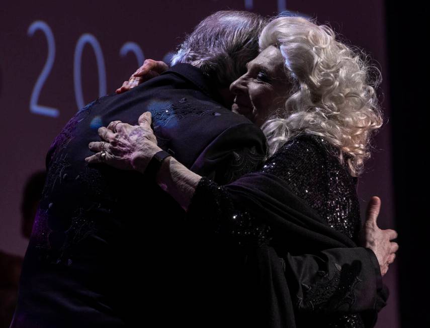 Grammy Award-winning singer, songwriter, author, activist and humanitarian Judy Collins, right, ...