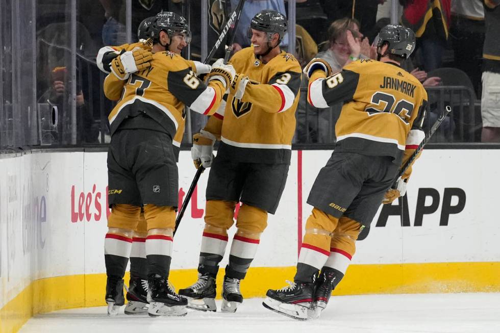 Vegas Golden Knights left wing Max Pacioretty, left, celebrates after scoring against the Arizo ...