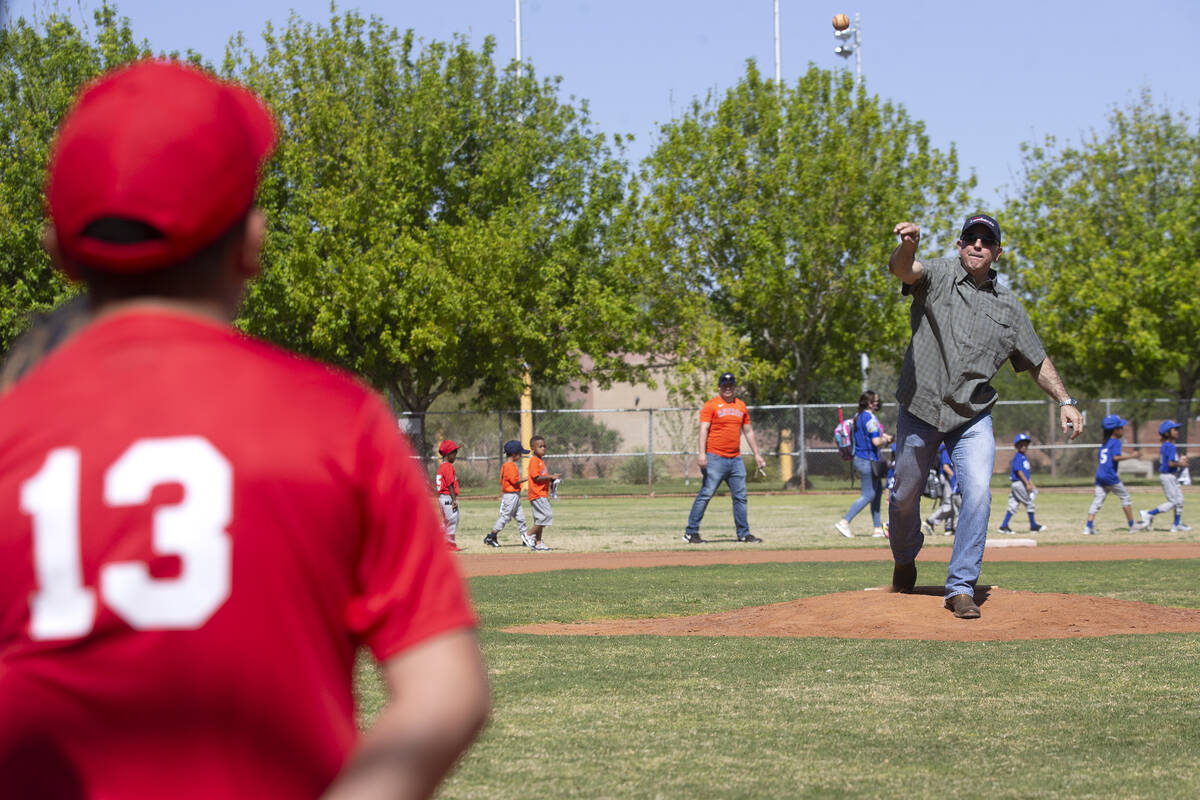 Sheriff Joe Lombardo throws the first pitch at Bolden Little League's first game of their sixth ...