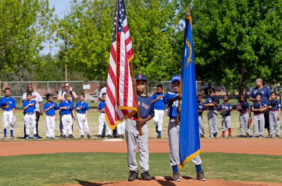 Bolden Little League players sing the National Anthem before Sheriff Joe Lombardo throws the fi ...