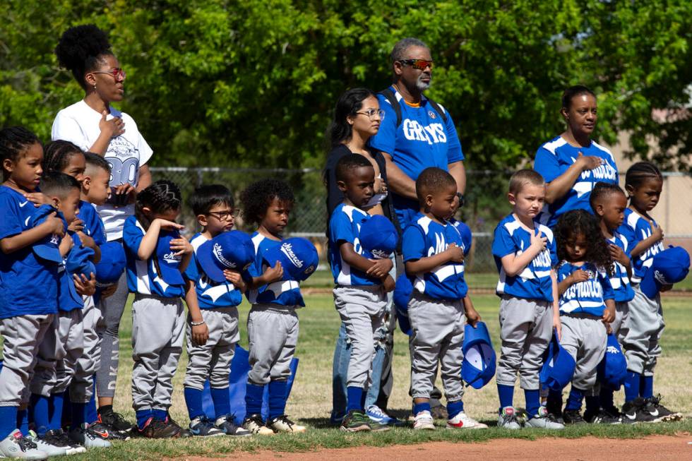 Bolden Little League players sing the National Anthem before Sheriff Joe Lombardo throws the fi ...