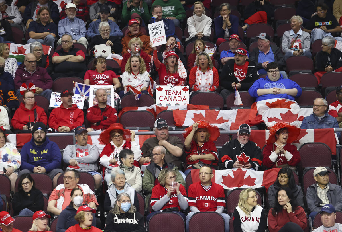 Canada fans cheer during the gold medal game against Sweden in the LGT World Men's Curling Cham ...