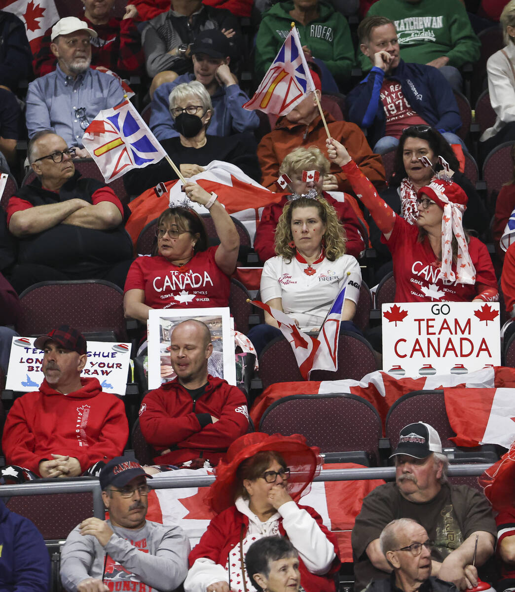 Canada fans react during the LGT World Men's Curling Championship final at the Orleans Arena on ...