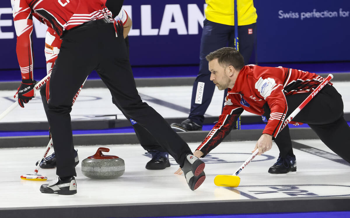 Canada skip Brad Gushue delivers a stone against Sweden in the gold medal game of the LGT World ...