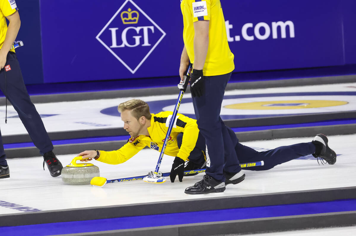 Sweden skip Niklas Edin delivers a stone against Canada in the gold medal game of the LGT World ...
