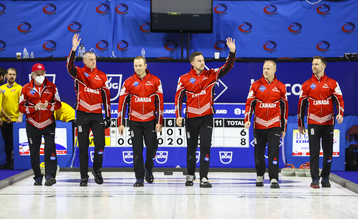Canada’s national team acknowledges the crowd after their loss to Sweden in the gold med ...