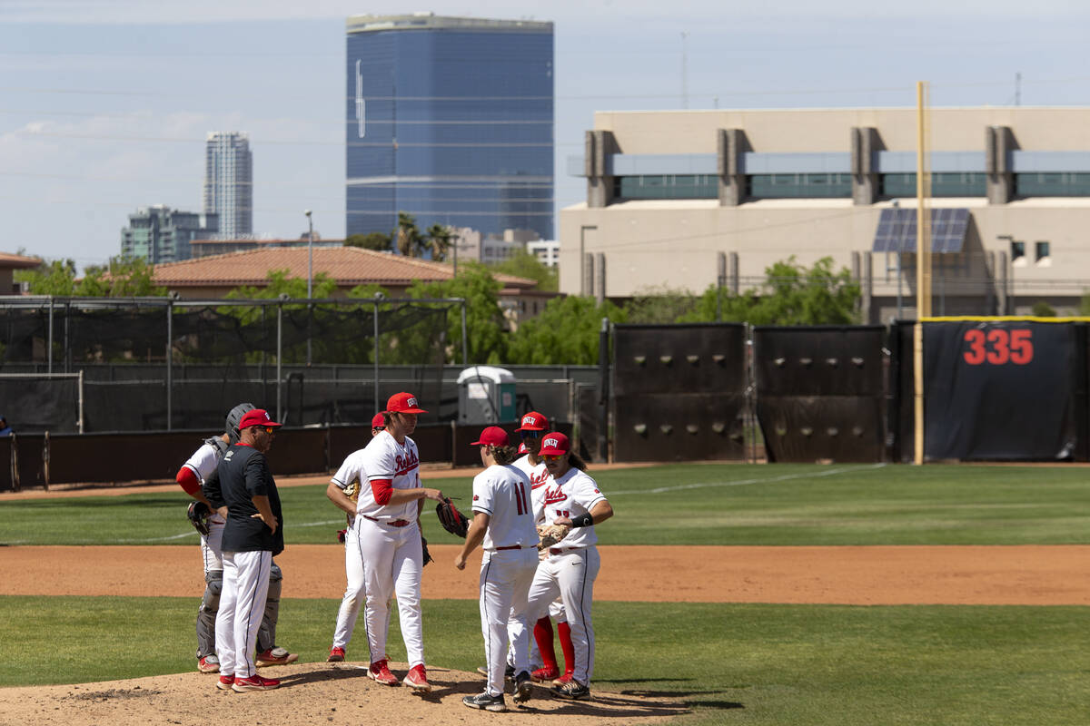 UNLV head coach Stan Stolte holds a time out during an NCAA baseball game against UNR at Earl W ...