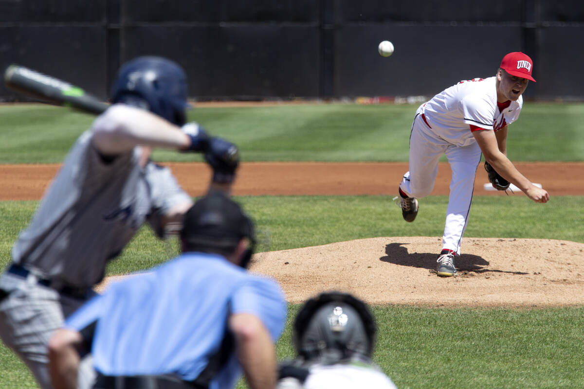 UNLV pitcher Noah Beal (32) pitches to UNR during an NCAA baseball game at Earl Wilson Stadium ...
