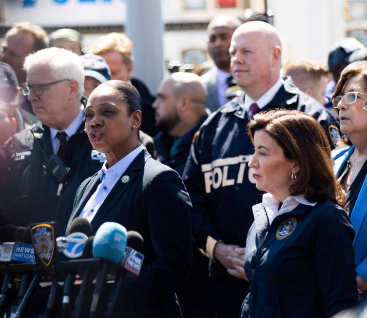New York City Police Commissioner Keechant Sewell, left, speaks during a press conference after ...