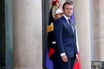 France's President Emmanuel Macron waits prior to welcoming Mexico's President Enrique Pena Nie ...