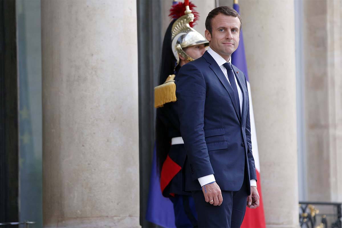 France's President Emmanuel Macron waits prior to welcoming Mexico's President Enrique Pena Nie ...