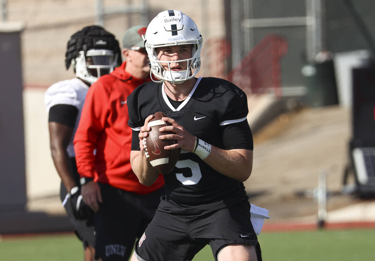UNLV Rebels quarterback Harrison Bailey (5) looks to throw a pass during the first day of sprin ...