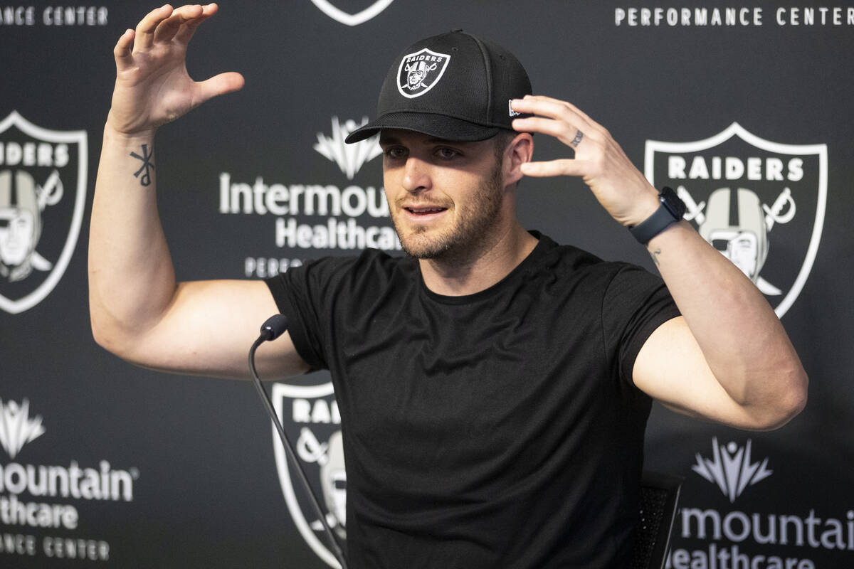 Raiders quarterback Derek Carr speaks on his three-year contract extension during a press confe ...