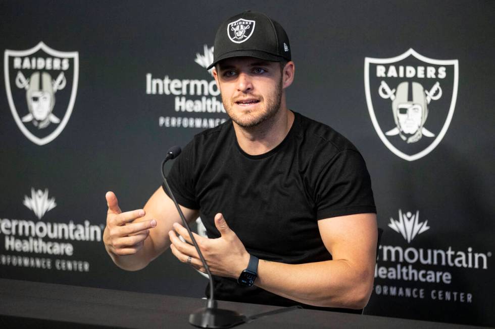 Raiders quarterback Derek Carr speaks on his three-year contract extension during a press confe ...