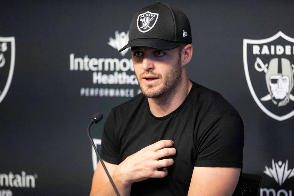 Raiders quarterback Derek Carr speaks on his three-year contract extension during a press confe ...