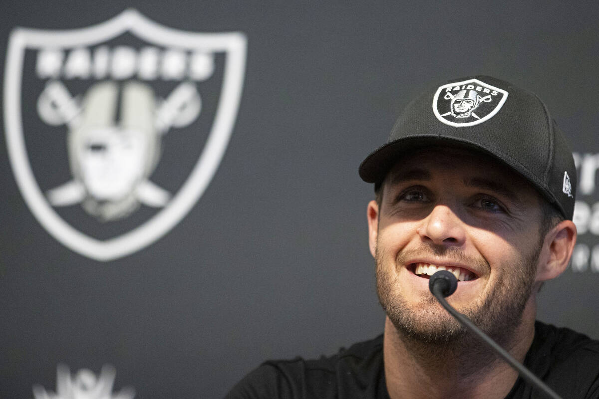 Raiders quarterback Derek Carr speaks on his three-year contract extension during a press confe ...