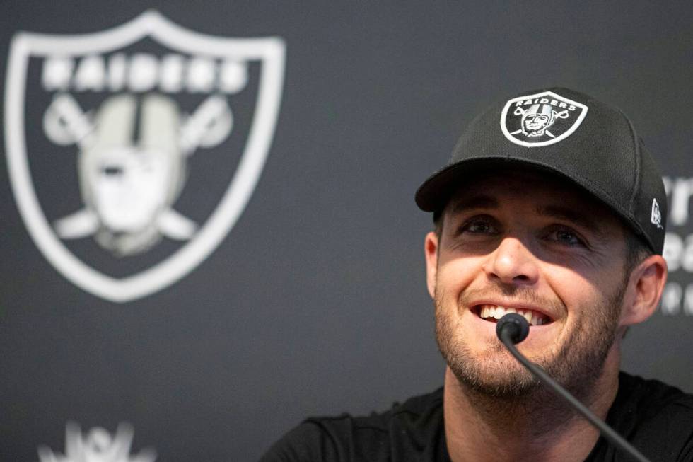 Raiders quarterback Derek Carr speaks on his three-year contract extension during a press confe ...