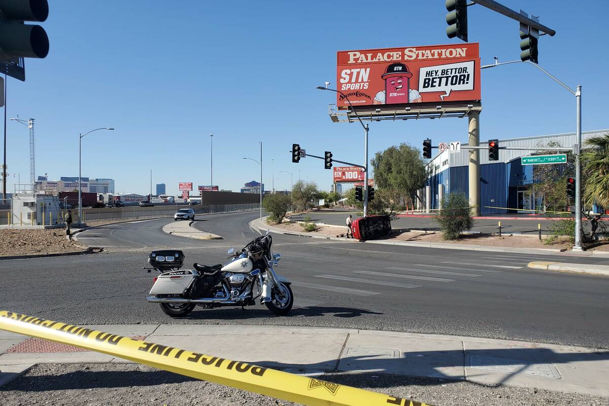 Police investigate a rollover crash on Rancho Drive near Teddy Drive, Wednesday, April 13, 2022 ...