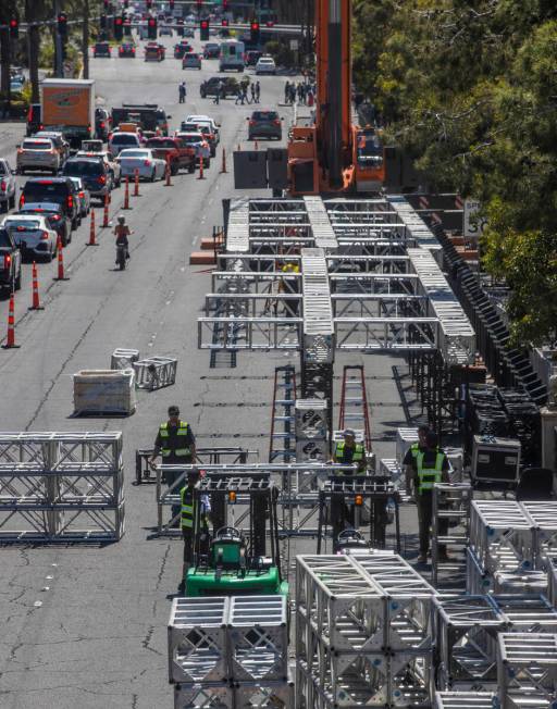 Construction workers assemble metal sections as work has started on the NFL red carpet draft st ...