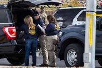 Las Vegas police assist the FBI in a barricade and shooting situation in northwest Las Vegas on ...