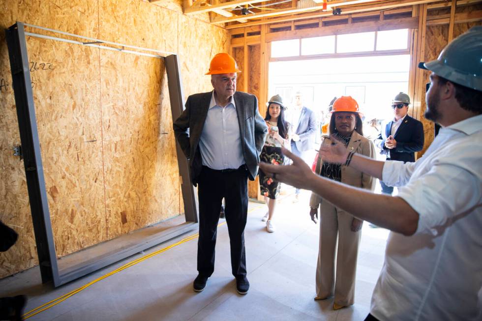 Governor Steve Sisolak, left, and U.S. Department of Housing and Urban Development Deputy Secre ...