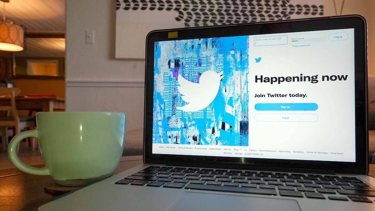The login/sign up screen for a Twitter account is seen on a laptop computer Tuesday, April 27, ...