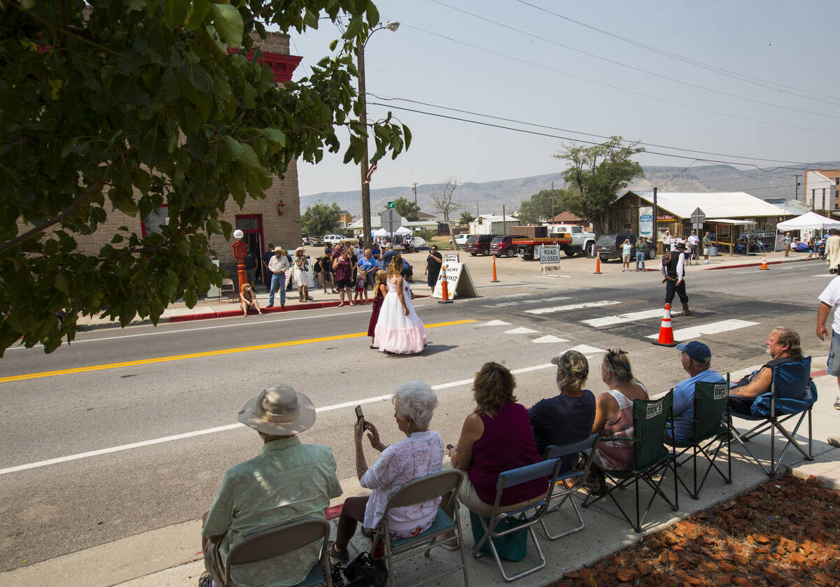 Attendees watch the parade during the Goldfield Days celebration in Goldfield on Saturday, Aug. ...