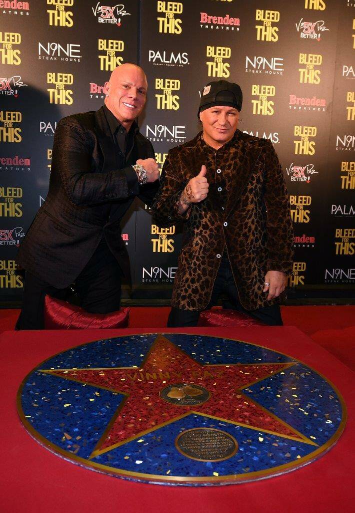 Vinny Paz, right, receives a star from Johnny Brenden at The Palms. (Jeff Bottari/Getty Images)