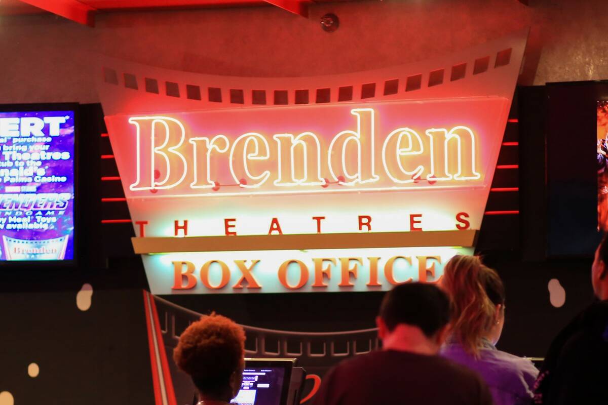 Movie goers buy tickets before the first showing of "Avengers: Endgame" at Brenden Theatres in ...