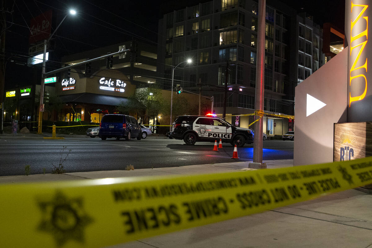 Metropolitan police investigate a homicide at 4680 South Maryland Parkway, across from the UNLV ...