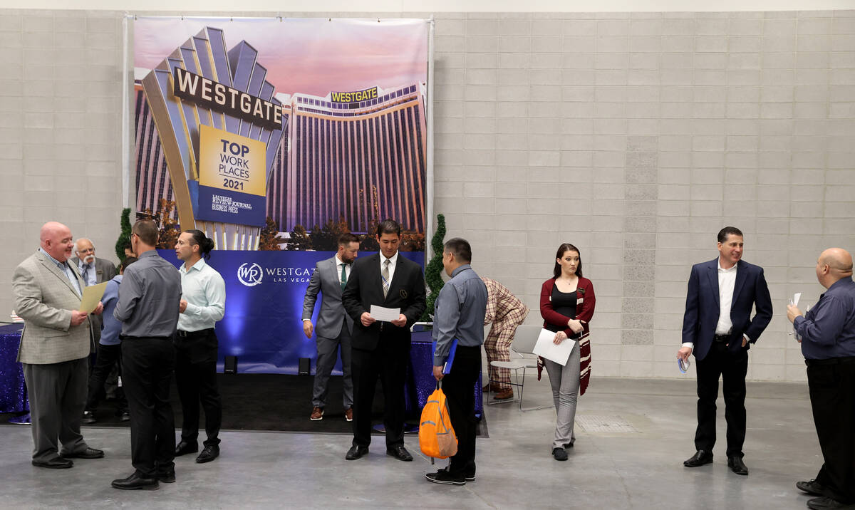 Westgate representatives talk to prospective employees during the Spring Job Fair at the Las Ve ...