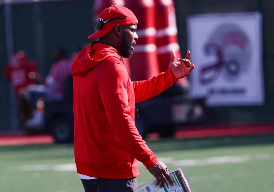 UNLV Rebels defensive coordinator Keith Heyward motions to his players during the first day of ...