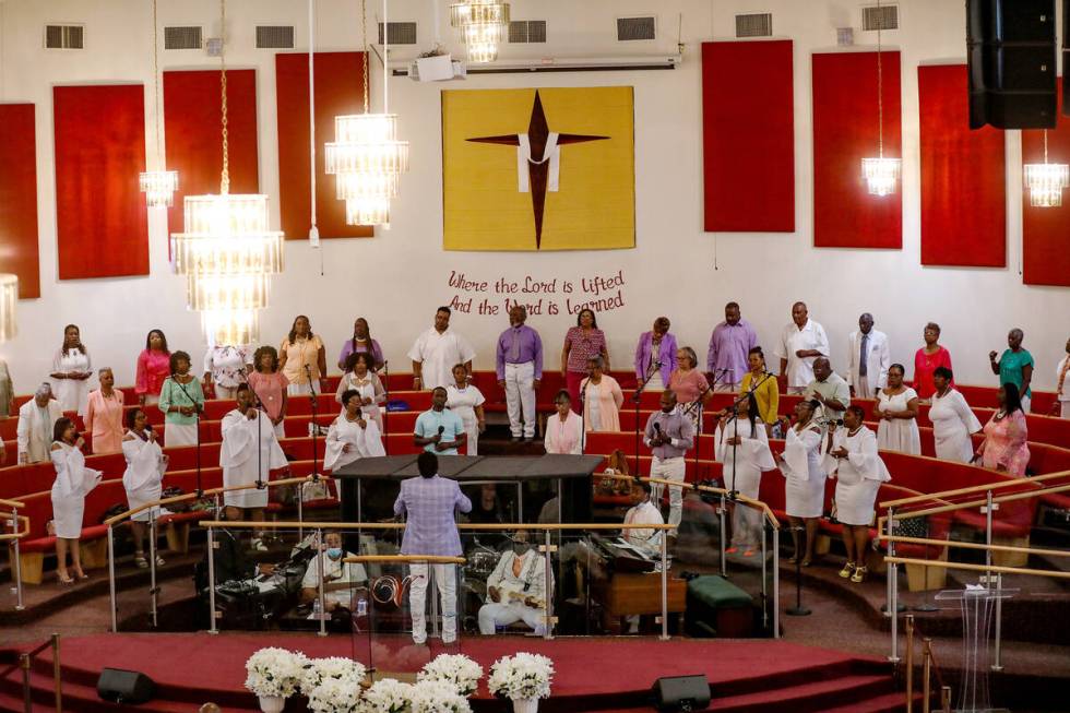 The choir leads the congregation in song during Easter service at Victory Missionary Baptist Ch ...