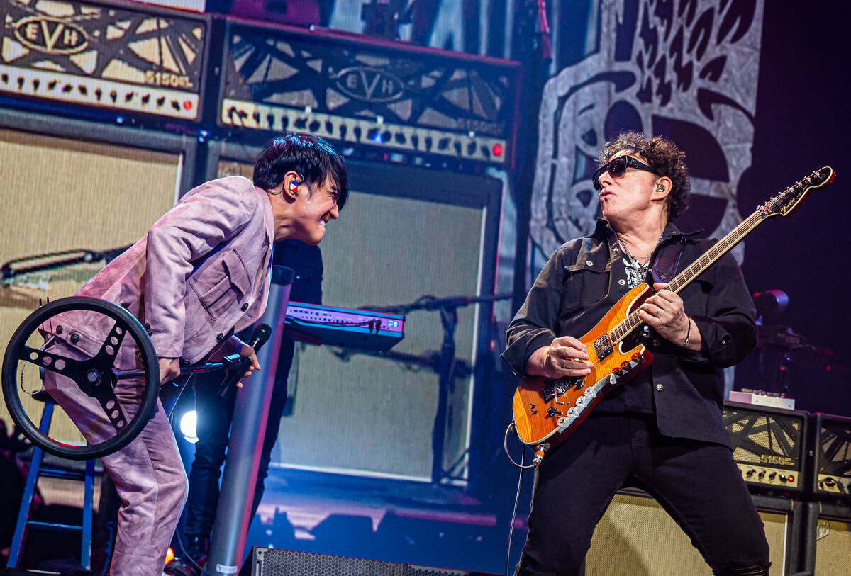 Arnel Pineda and Neal Schon of Journey (Erik Kabik).