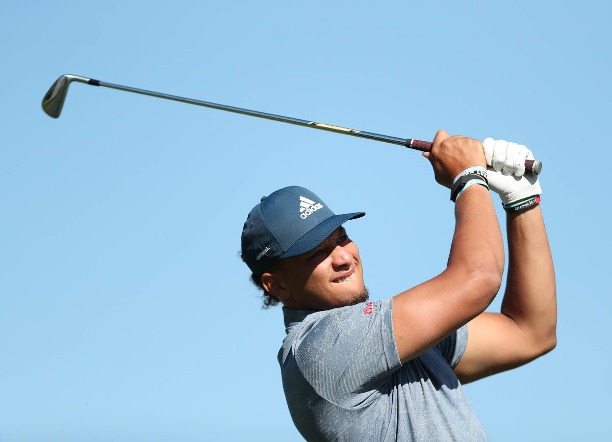 NFL quarterback Patrick Mahomes tees off from the first hole during the final round of the Amer ...