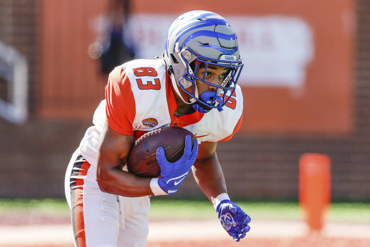 American Team wide receiver Calvin Austin III, of Memphis, returns the opening kickoff in the f ...